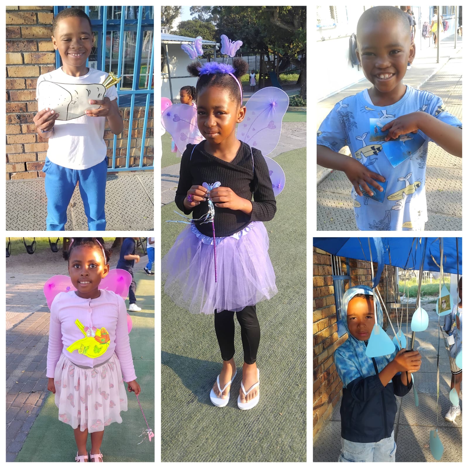 Five children stand outdoors, each holding handmade crafts. One girl is dressed as a fairy in purple wings and tutu. The other children wear casual clothes, holding various art projects and smiling at the camera.